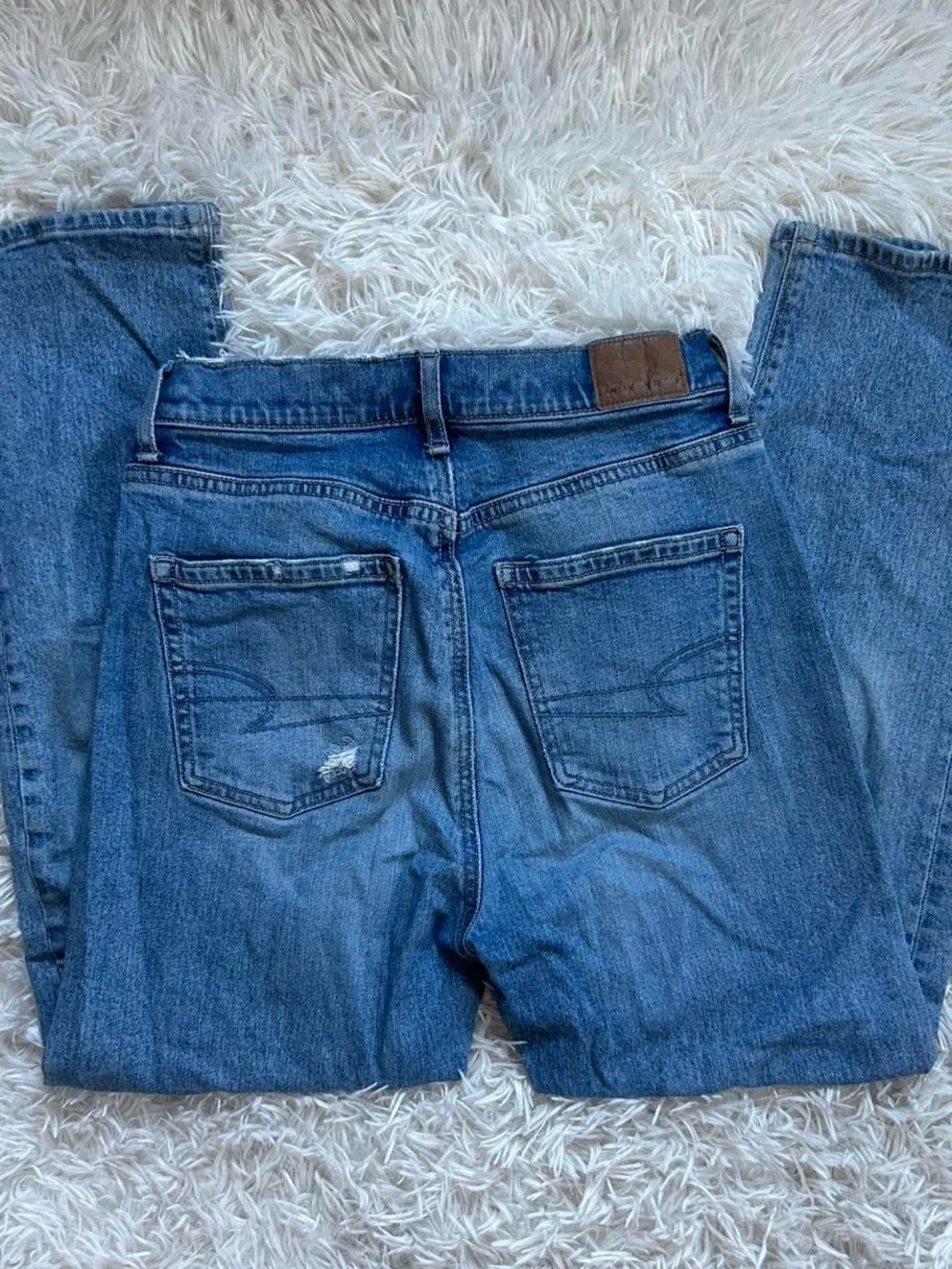 American Eagle Outfitters Light Blue High-Rise Distressed Jeans